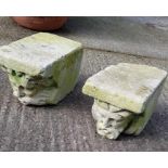 A pair of antique carved stone corbels worked