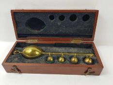 A vintage Bate's brass revenue saccharometer by Lo