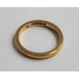 A 22ct gold wedding band, 2.6mm wide, 4.04 grams g