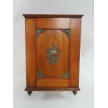 A late 19th/early 20th century wall cabinet with d