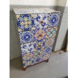 A 20th century decorative chest of five long drawe
