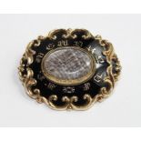 A 9ct gold ornate Victorian mourning brooch, the c