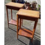 A pair of small two tier side tables with chequere