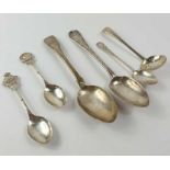 A silver Georgian sifting spoon; a silver teaspoon