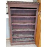 A Victorian oak open bookcase with castellated top