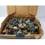 A large quantity of plastic toy soldiers, many dif