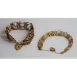 A 9ct gold wide six twisted bar gate bracelet with
