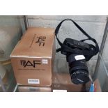 NikonF-801 camera with an AF Nikkor lense along wi