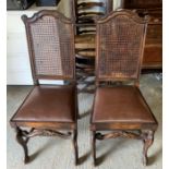 Pair of decorative oak framed side chairs with rus