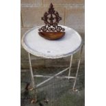 White painted wrought iron collapsible table along