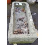 Carved stone trough planter