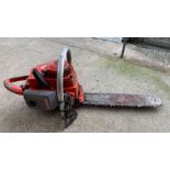 Homelite Super XL petrol chainsaw along with new c