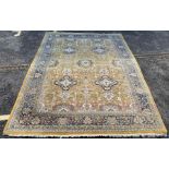 Large blue, orange, yellow, floral patterned rug w