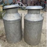 2 aluminium milk churns with lids