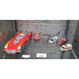Collectable toy cars including a tin plate racing