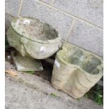 Reconstituted stone urn planter along with another