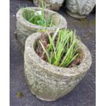 Pair of small round reconstituted stone planters