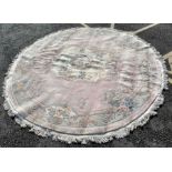 Large round pink, cream and floral rug, 318cm diam