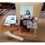 Essex miniature sewing machine in box.