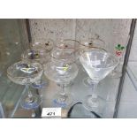 8 Babycham glasses along with a sherry glass and o