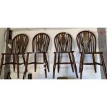 Set of four wheelback dining chairs along with 2 o