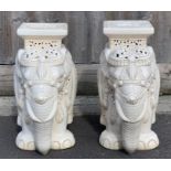 A pair of Chinese plant stands/seats, each in t