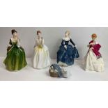 A collection of three Royal Doulton figures of fema