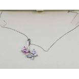 A 9ct white gold pink and white CZ butterfly penda