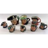 A collection of eight Royal Doulton character jugs