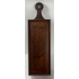 A 19th century oak candle box, with sliding door,