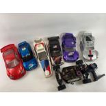 A collection of radio controlled car shells, and o