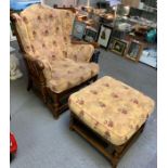 An Ercol chair and stool