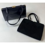 A vintage leather handbag and matching purse, alon