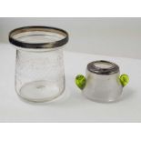 A glass jar with acid etched decoration and silver