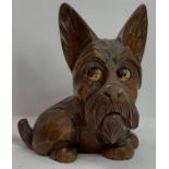 A mid century German clock in the form of a dog with