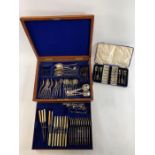 A cased part canteen of silver plated cutlery cont