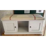 Painted storage bench with upholstered seat