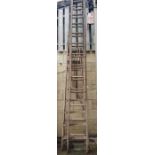 Large extending wooden ladder along with another w