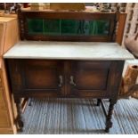 Oak washstand with marble top and tiled back