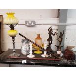 2 leather canes along with an oil lamp, 2 metal f