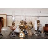 Collection of various oil lamps