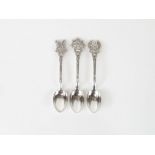 A set of three silver coloured egg spoons; each wi