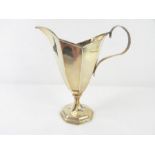 A silver cream jug, HH&S, Birmingham 1900, of pane