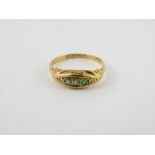 A rose cut diamond and emerald 18 carat gold ring, fin