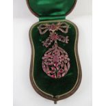 A brooch with pendant drop, with foiled pastes to