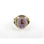 A Victorian sardonyx ring, unmarked, with a crest