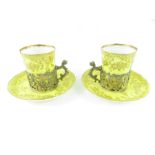 A pair of Crown Staffordshire yellow and gilt coff