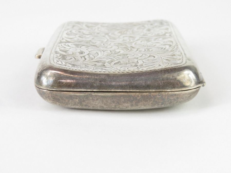 A silver cigarette case with engraved decoration, - Image 3 of 9