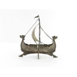 A silver coloured model of a Viking longship, 14.5
