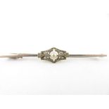 A diamond and pearl bar brooch, the white metal ba